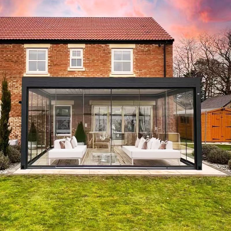 Aluminum pergola enclosed with sliding glass doors for a residential outdoor room